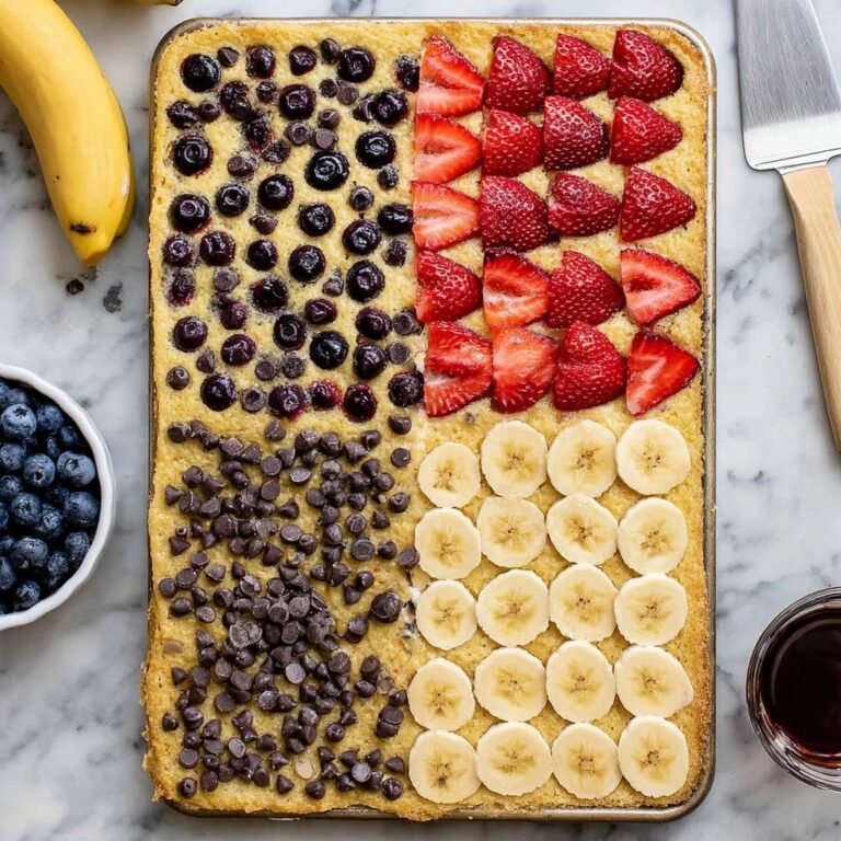 Sheet Pan Pancakes with Fresh Berries, Bananas, and Chocolate Chips Recipe